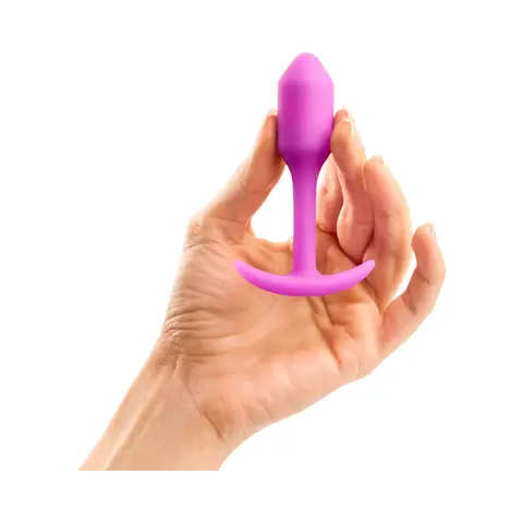 B-Vibe Snug Plug 1 Weighted Silicone Anal Plug in Fuchsia